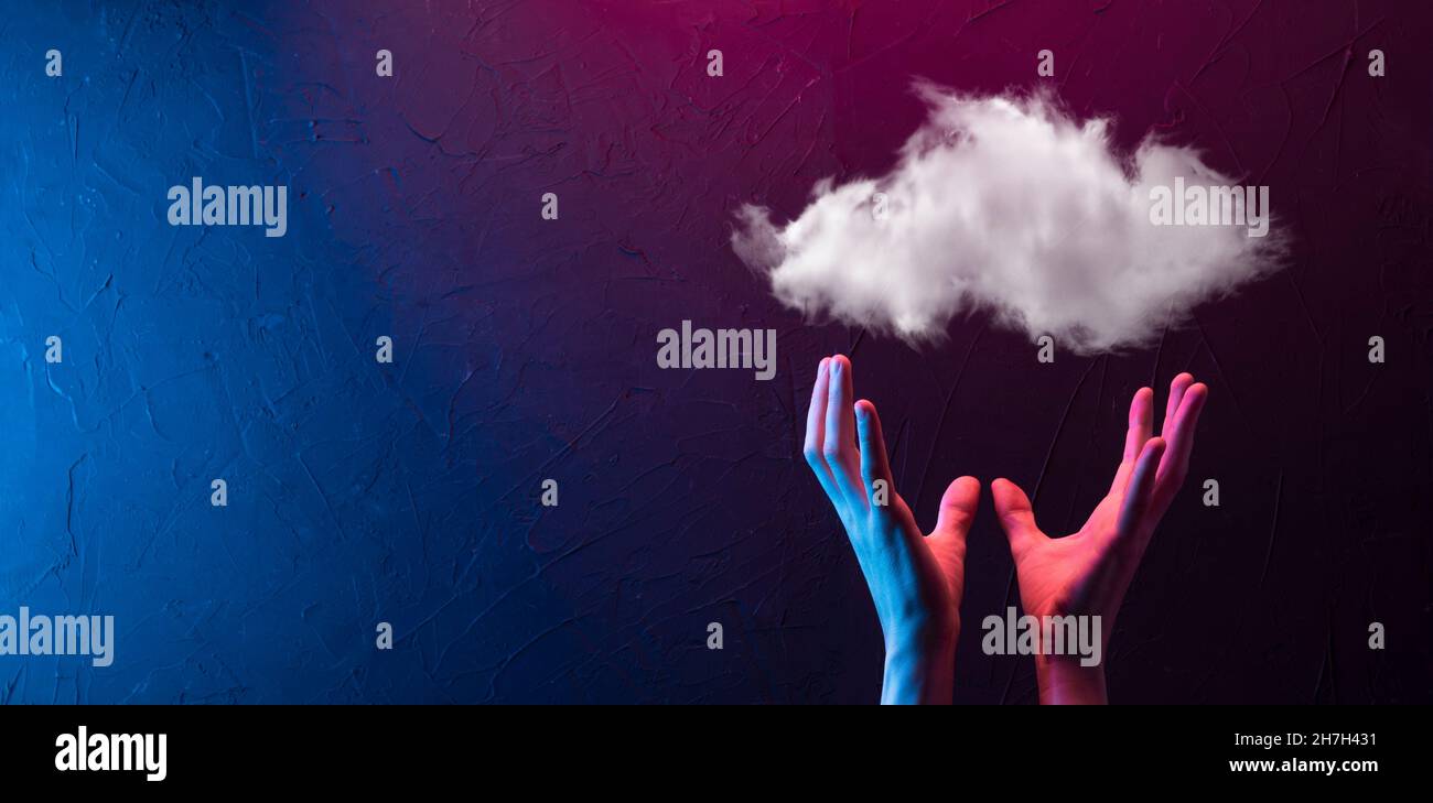 Hand holding icon cloud computing network and icon connection data information in hand. Cloud computing and technology concept Stock Photo