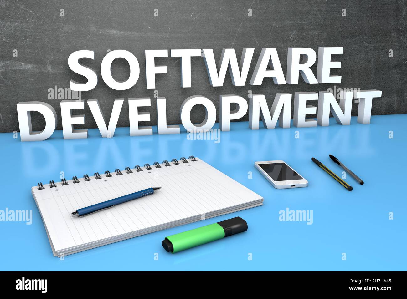 Software Development - text concept with chalkboard, notebook, pens and ...