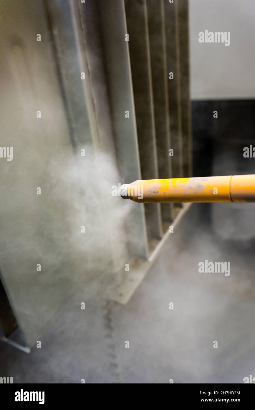 Tip of the powder coating gun Stock Photo Alamy