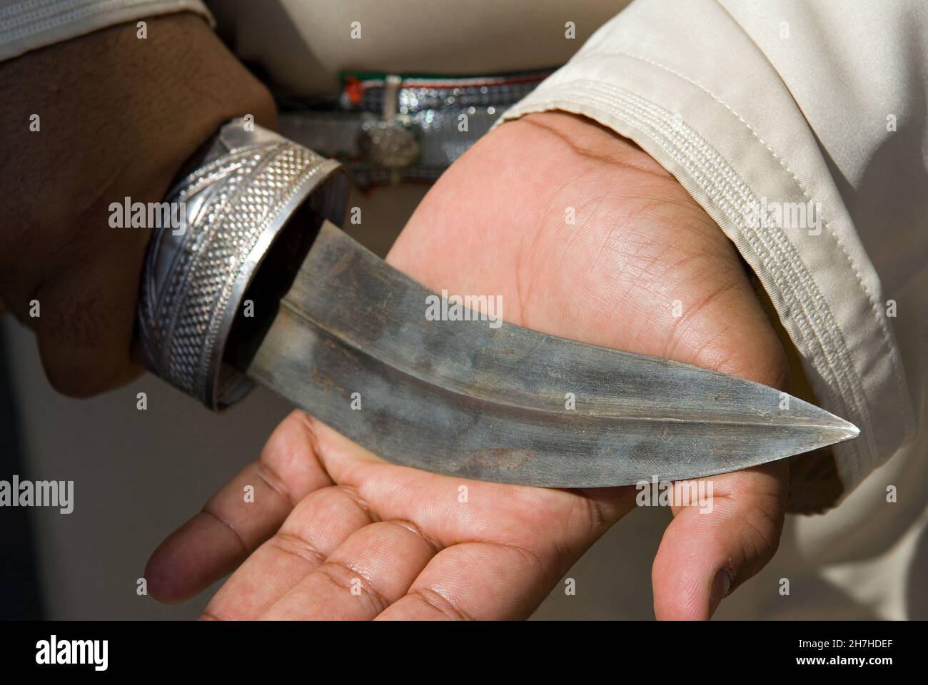 SULTANATE OF OMAN, BEDOUINS AND KHANJAR (KHANJAR IS THE TRADITIONAL OMANI CURVE DAGGER) Stock Photo