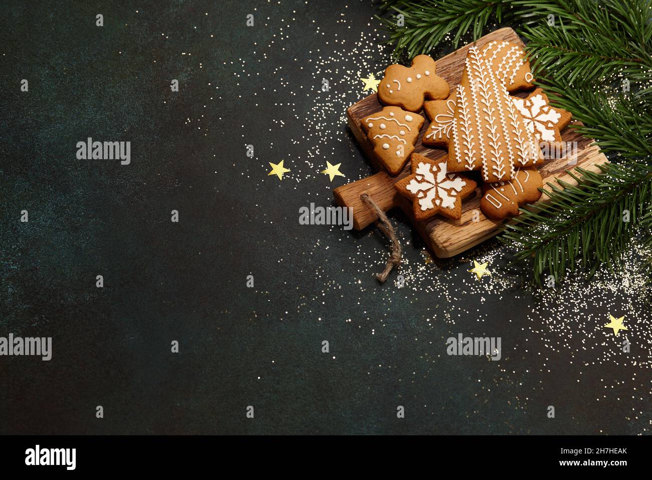 Christmas gingerbread cookies on textured table background Stock Photo