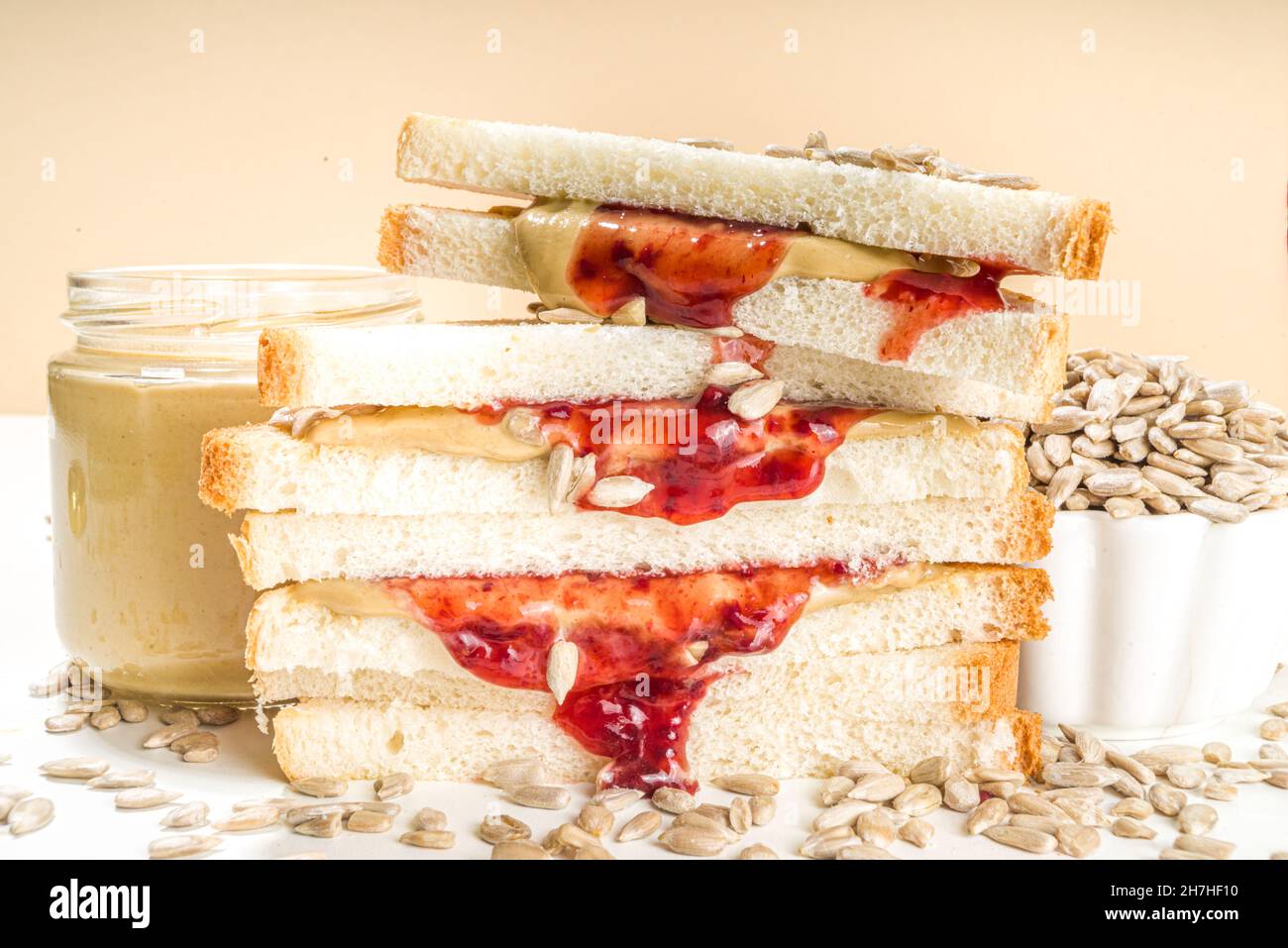 Traditional American breakfast sandwich toast with alternative not nut butter sunflower seeds