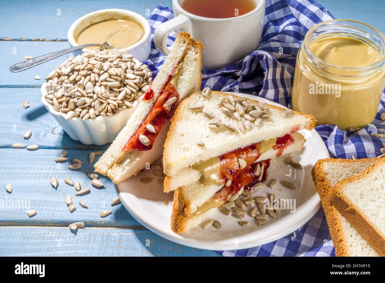 Traditional American breakfast sandwich toast with alternative not nut butter sunflower seeds