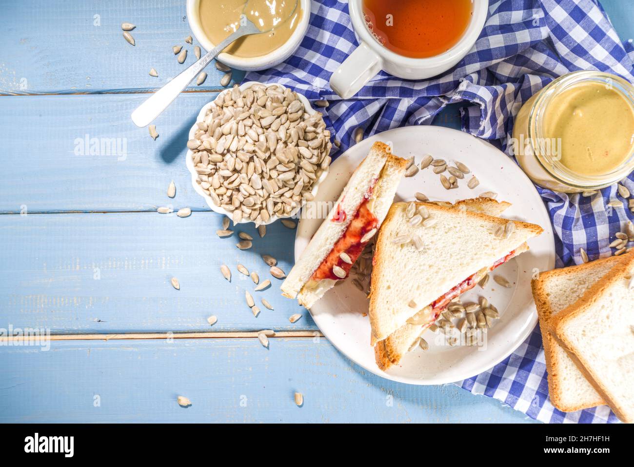 Traditional American breakfast sandwich toast with alternative not nut butter sunflower seeds