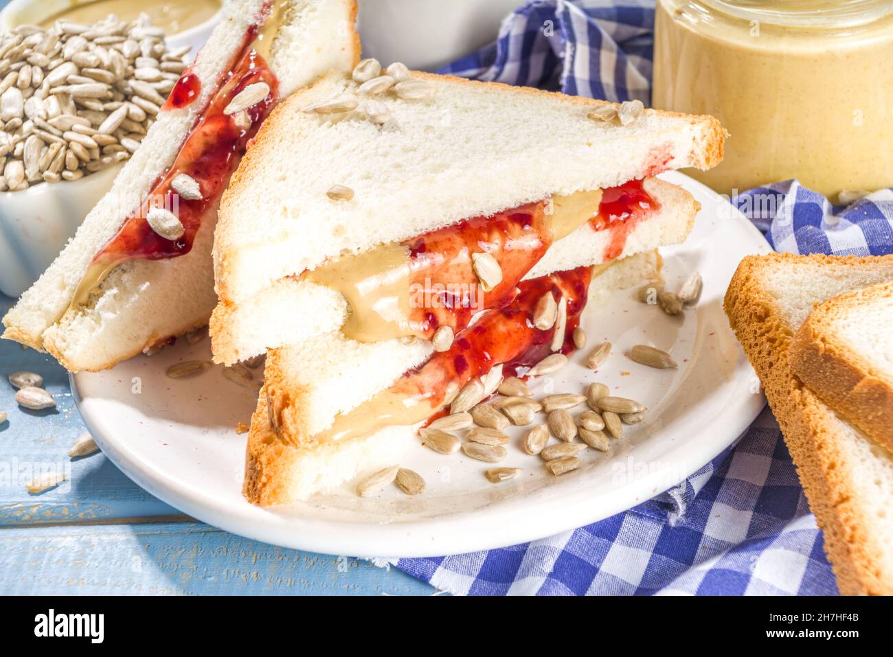Traditional American breakfast sandwich toast with alternative not nut butter sunflower seeds