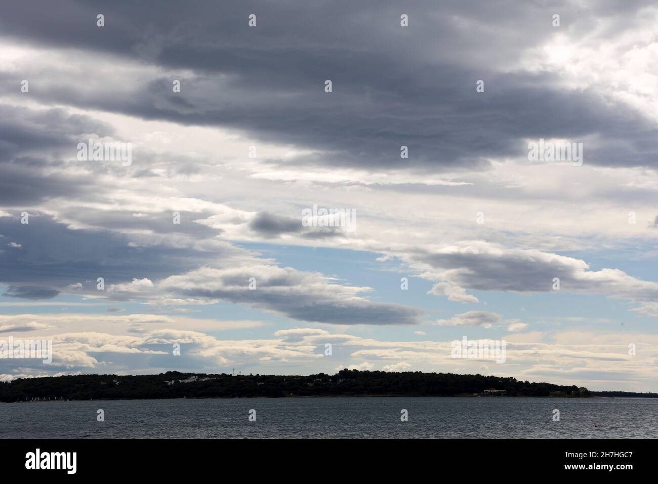 Mixed clouds near Novigrad, Istria, Croatia, Europe. Stock Photo