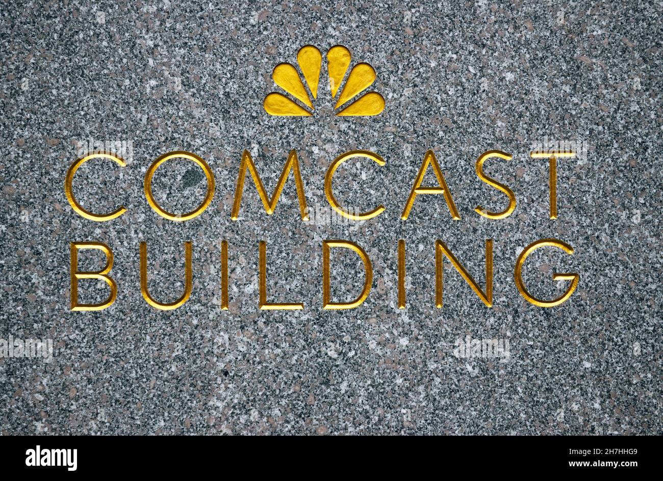 Comcast sign and logo on building in Rockefeller Center Manhattan NYC Stock Photo