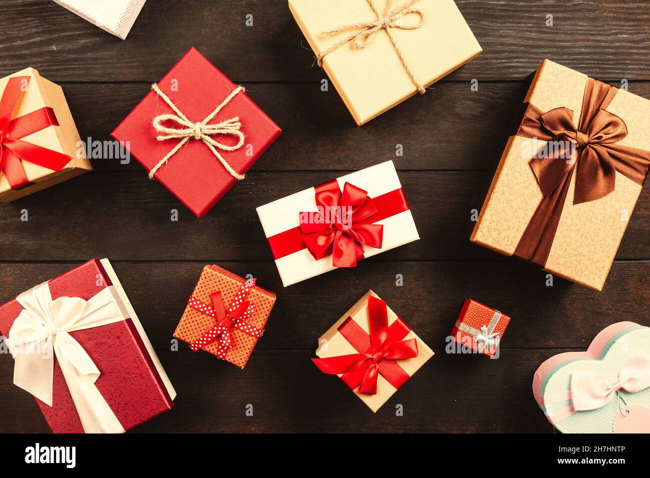 Christmas background with gift boxes on wooden table Stock Photo