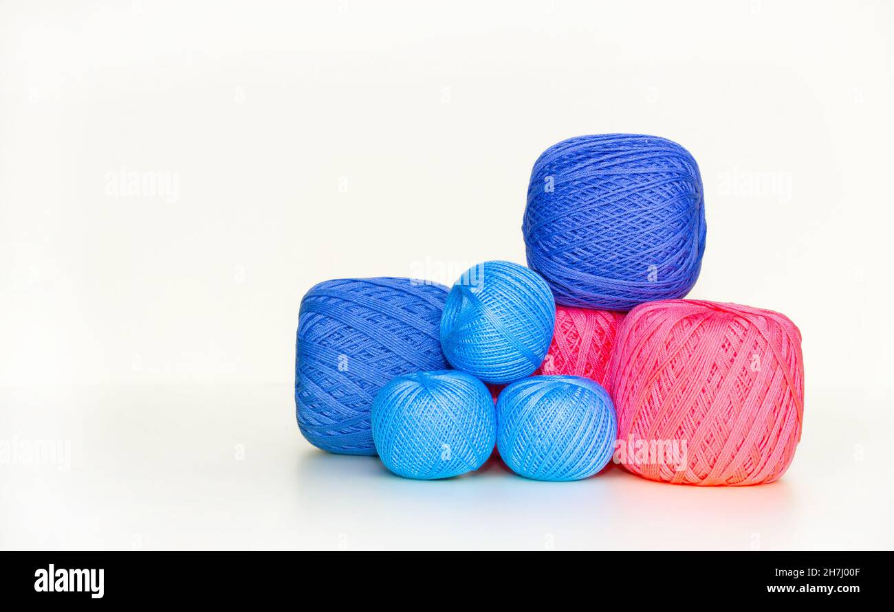 Balls of multicolored yarn, great designs for any purpose. White background. Hobby concept. Stock Photo