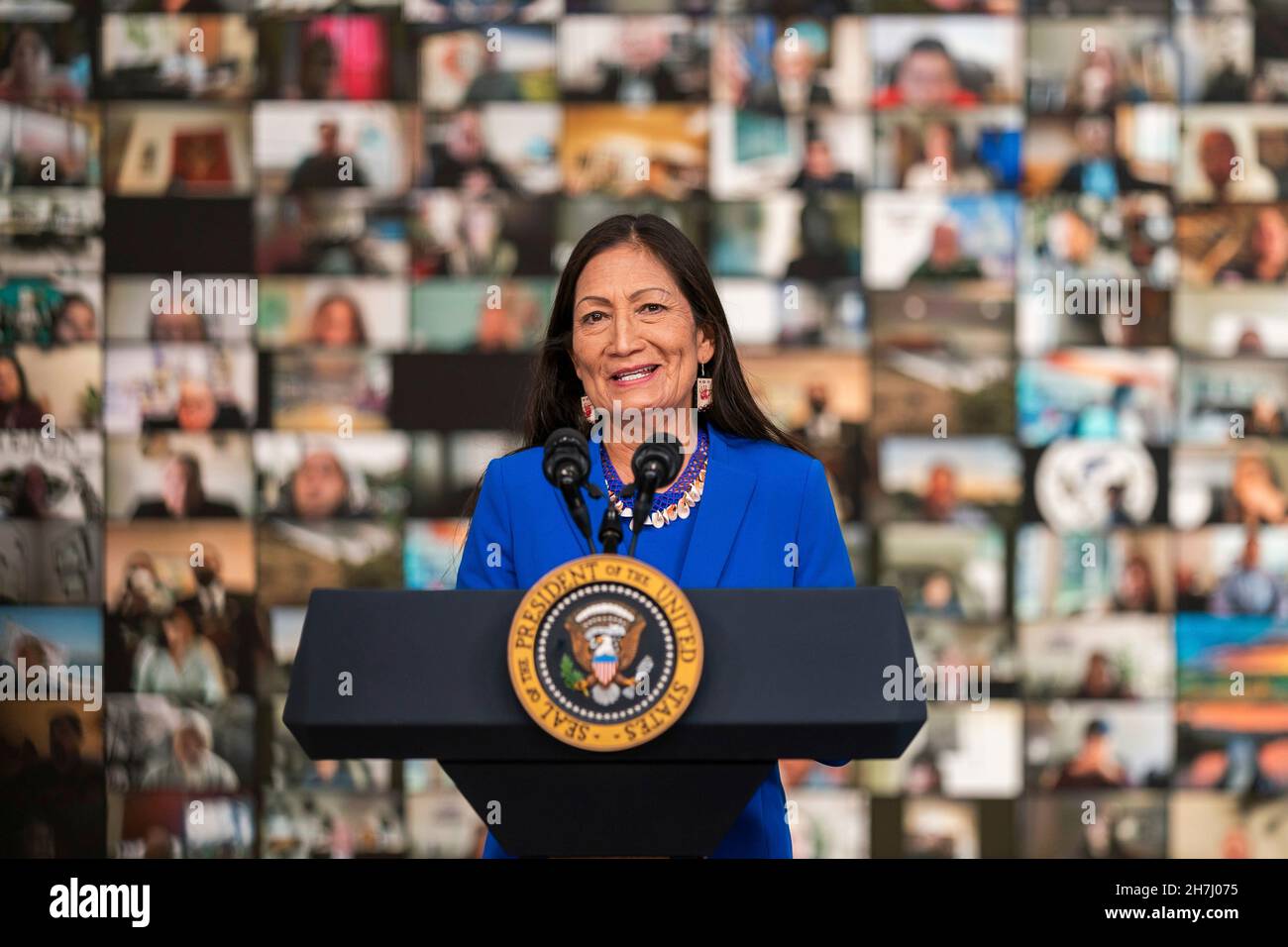 Washington, United States of America. 16 November, 2021. U.S Interior Secretary Deb Haaland delivers a virtual address to the White House Tribal Nations Summit by video link in the Eisenhower Executive Office Building Ceremonial Office November 15, 2021 in Washington, D.C. Credit: Tami A. Heilemann/U.S. Interior Department/Alamy Live News Stock Photo