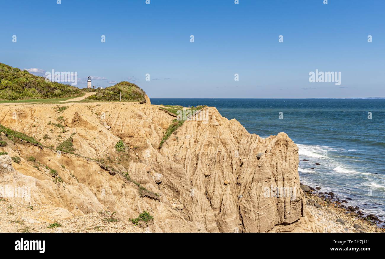 Camp Hero State Park bluffs with distant Montauk Lighthouse. Stock Photo
