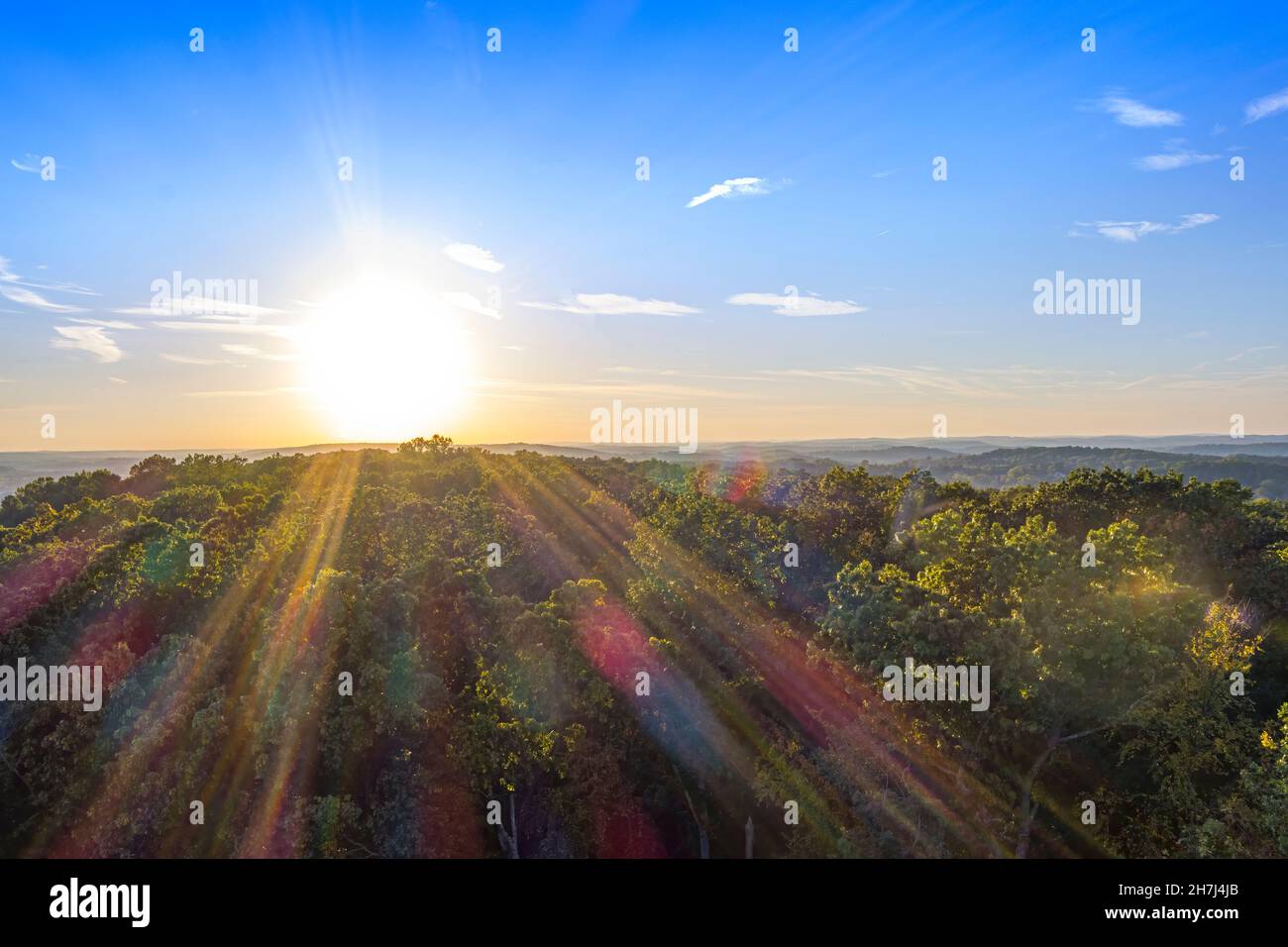 Aerial view of sunset above tree tops, Pennsylvania, USA Stock Photo