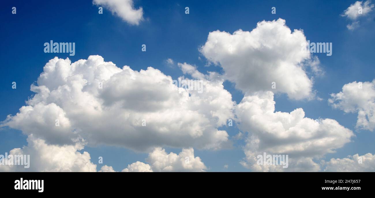 Clouds flying in summer sky. Spiritual background, atmosphere of meditation and serenity Stock Photo
