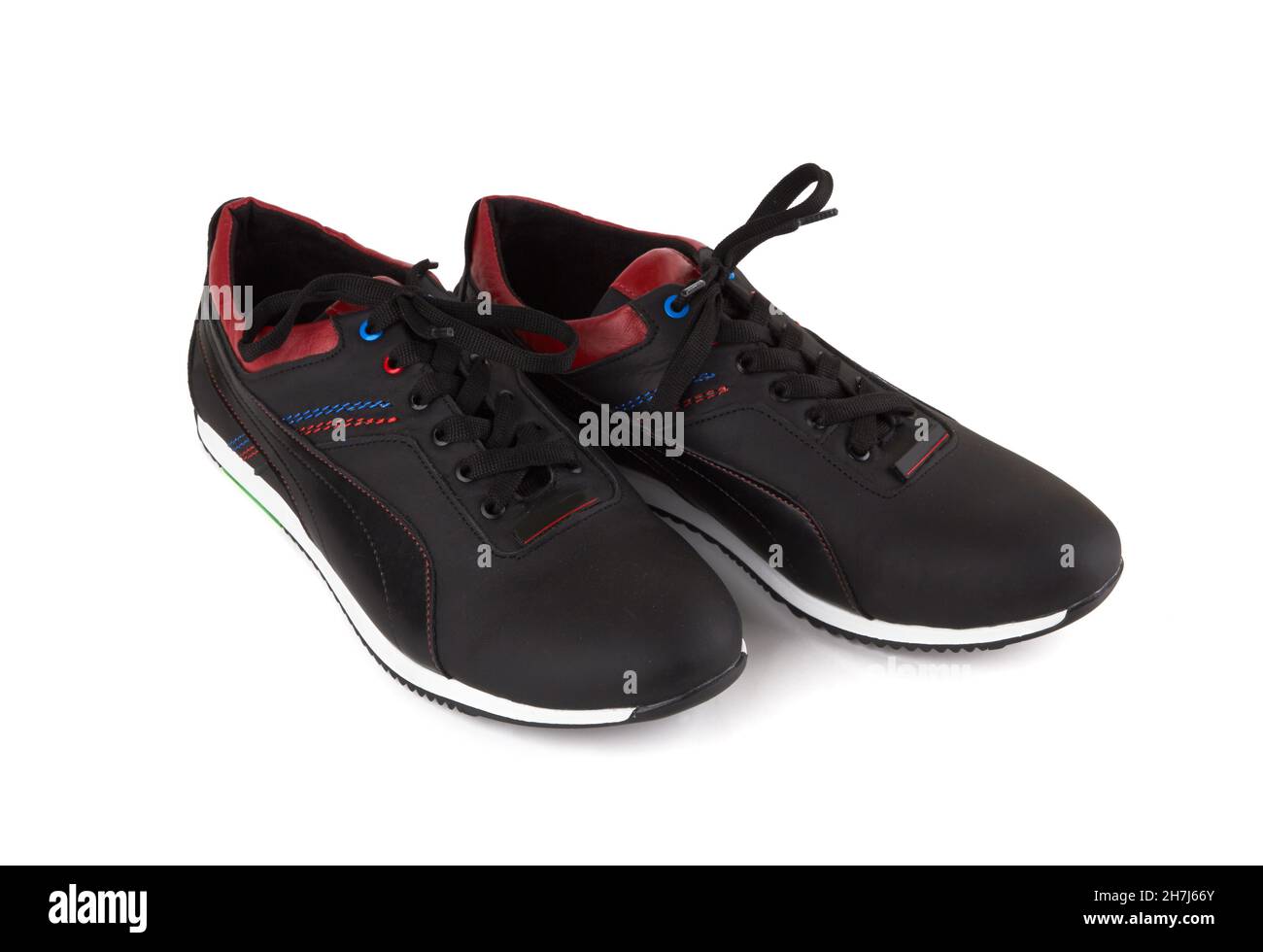 Black sneakers isolated on a white background Stock Photo