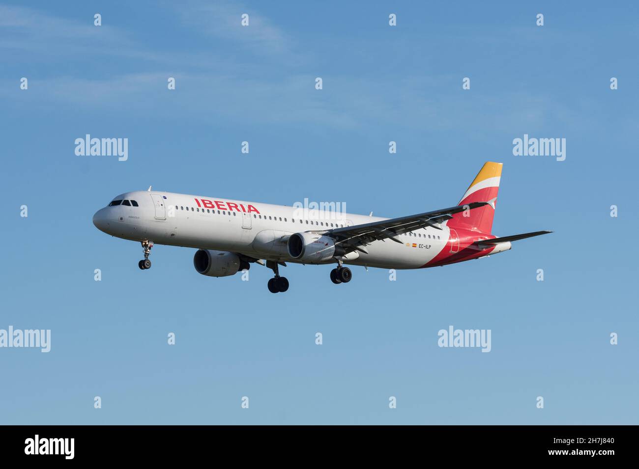 BARCELONA, SPAIN - Oct 25, 2021: Big passenger airline plane in the sky. Airbus A321 of Iberia Stock Photo
