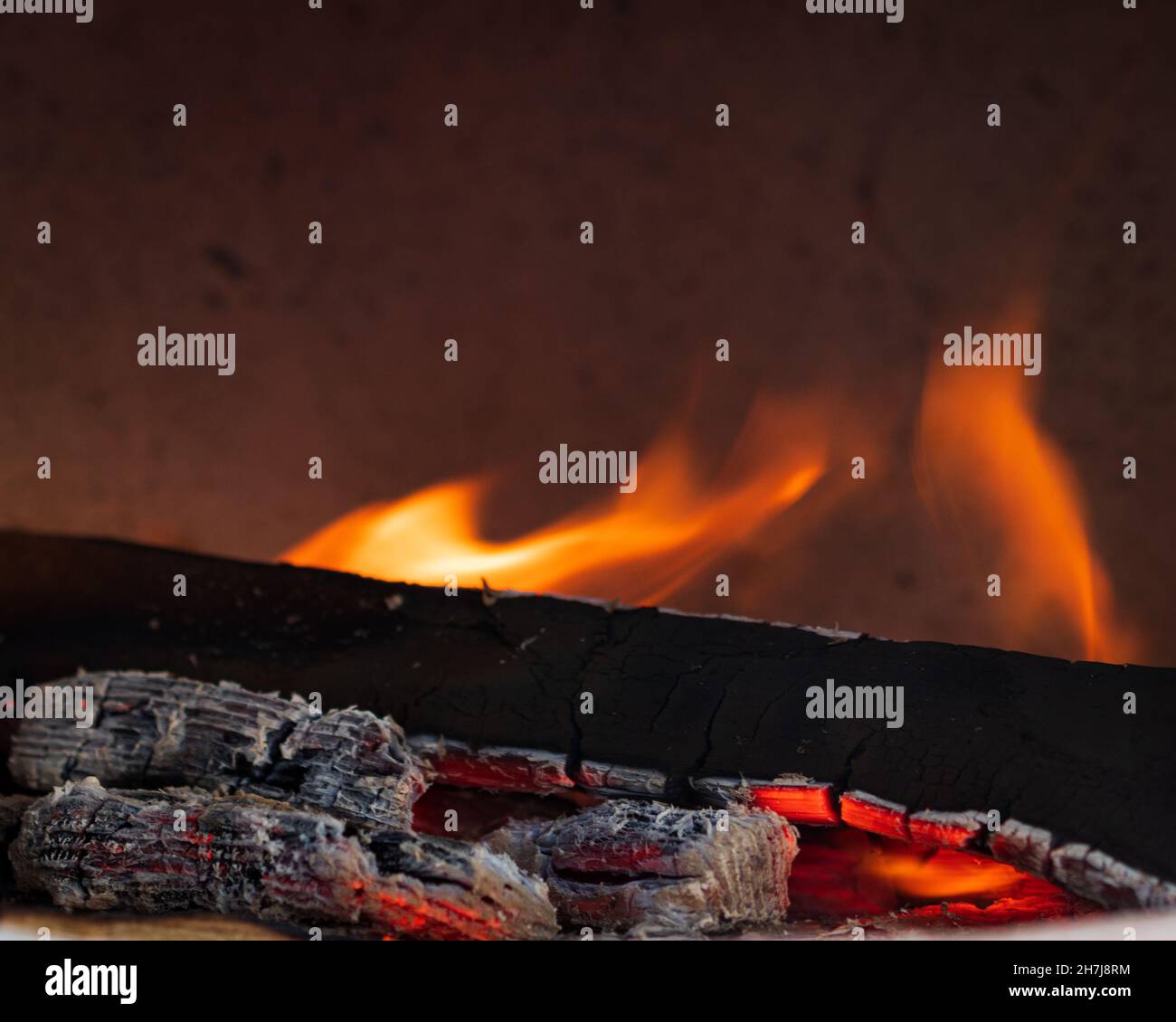 Closeup of fire flame and burning firewood Stock Photo - Alamy