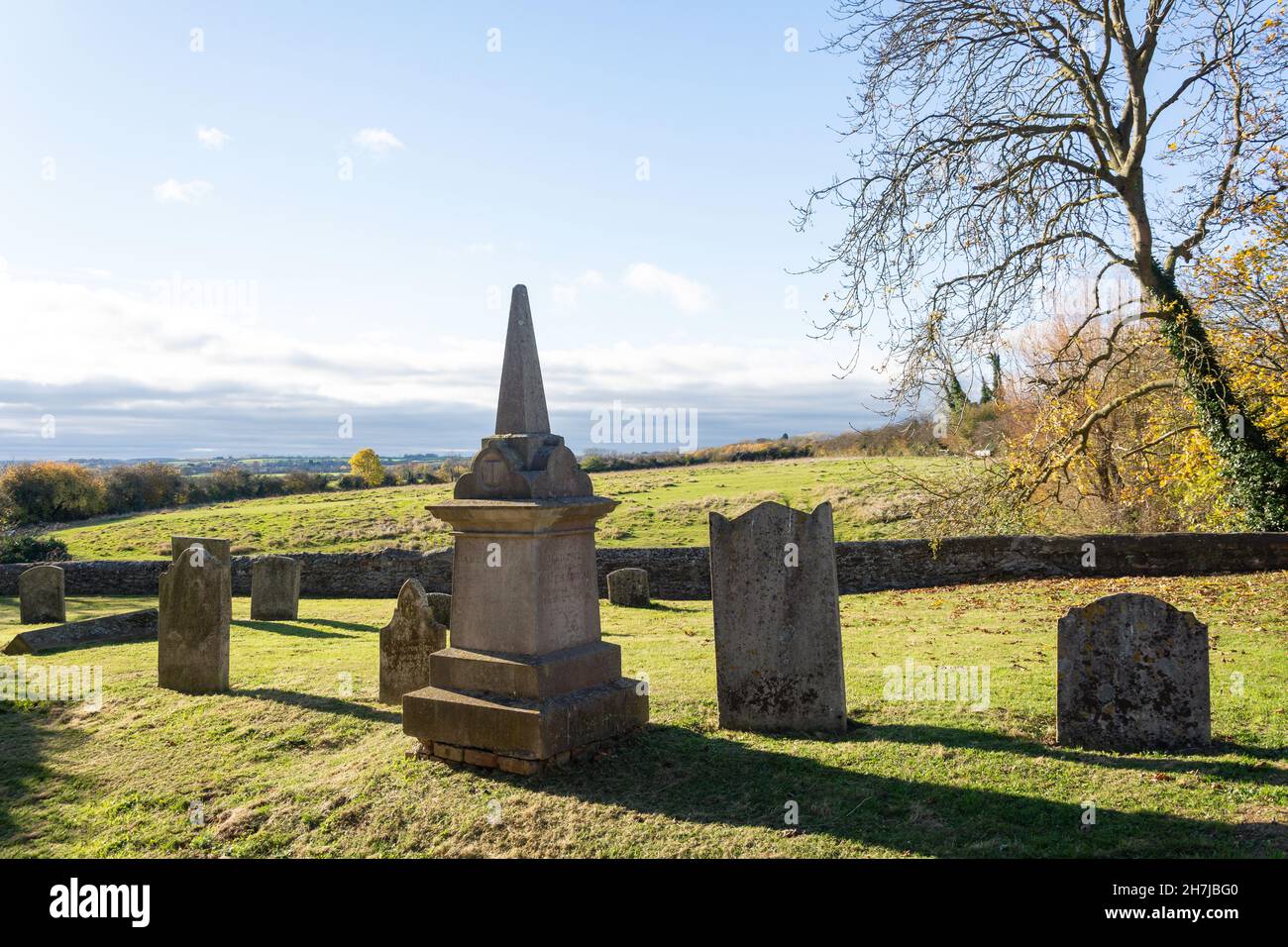 Graveyard and countryside, St Peter's Church, Church Street, Yaxley, Cambridgeshire, England, United Kingdom Stock Photo