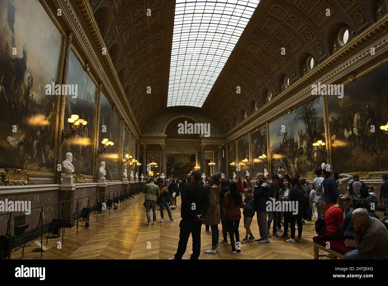 PARIS, FRANCE - Oct 01, 2019: The tourists walking around Gallery of Great Battles in Palace of Versailles at Paris, France Stock Photo