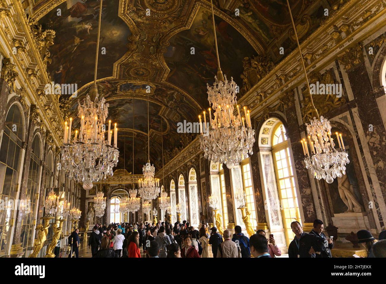 PARIS, FRANCE - Oct 01, 2019: A low angle shot of chandeliers on the ceilings in Palace of Versailles, Paris, France Stock Photo