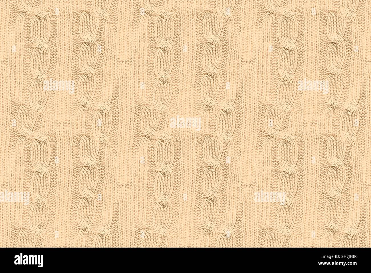 Beige Woolen Thread. Abstract Knitted Pattern. Stock Photo