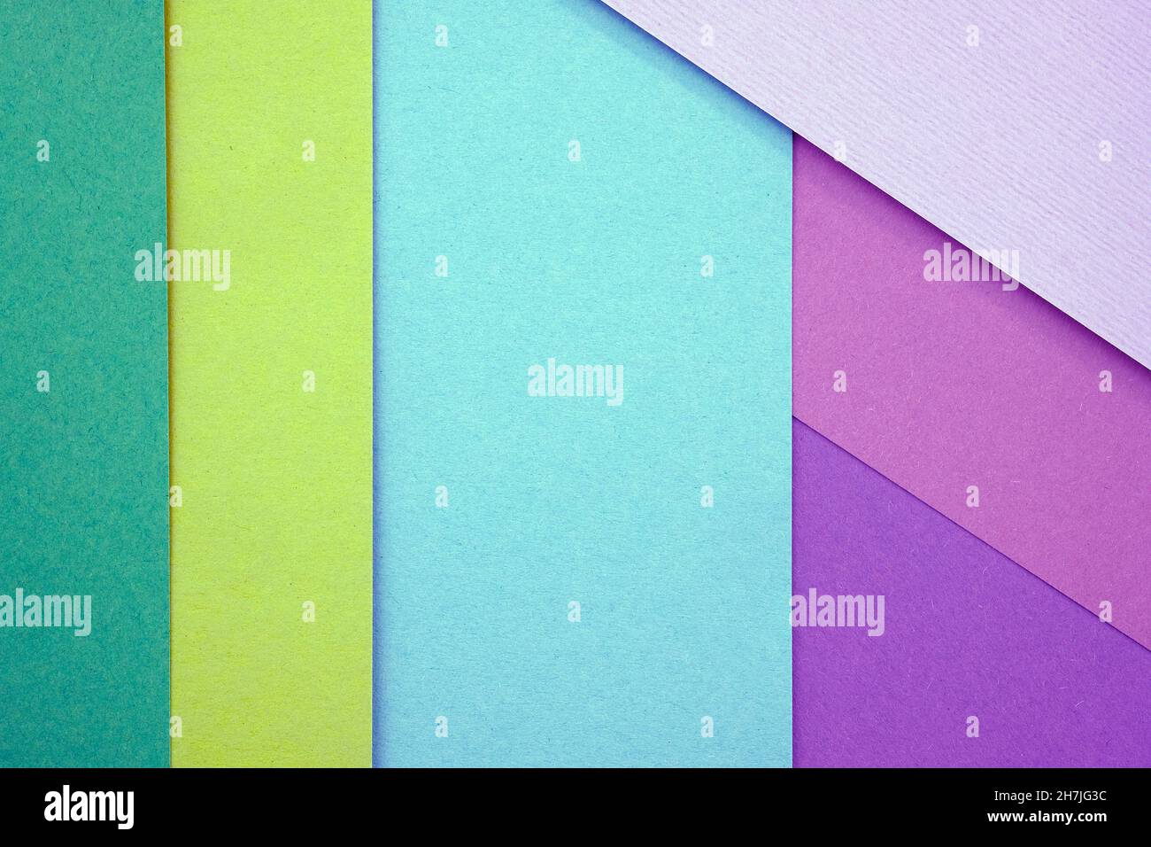 Abstract background from sheets of pink, and green paper. Abstract paper colorful background, creative design. background with geometric shapes. Thick Stock Photo