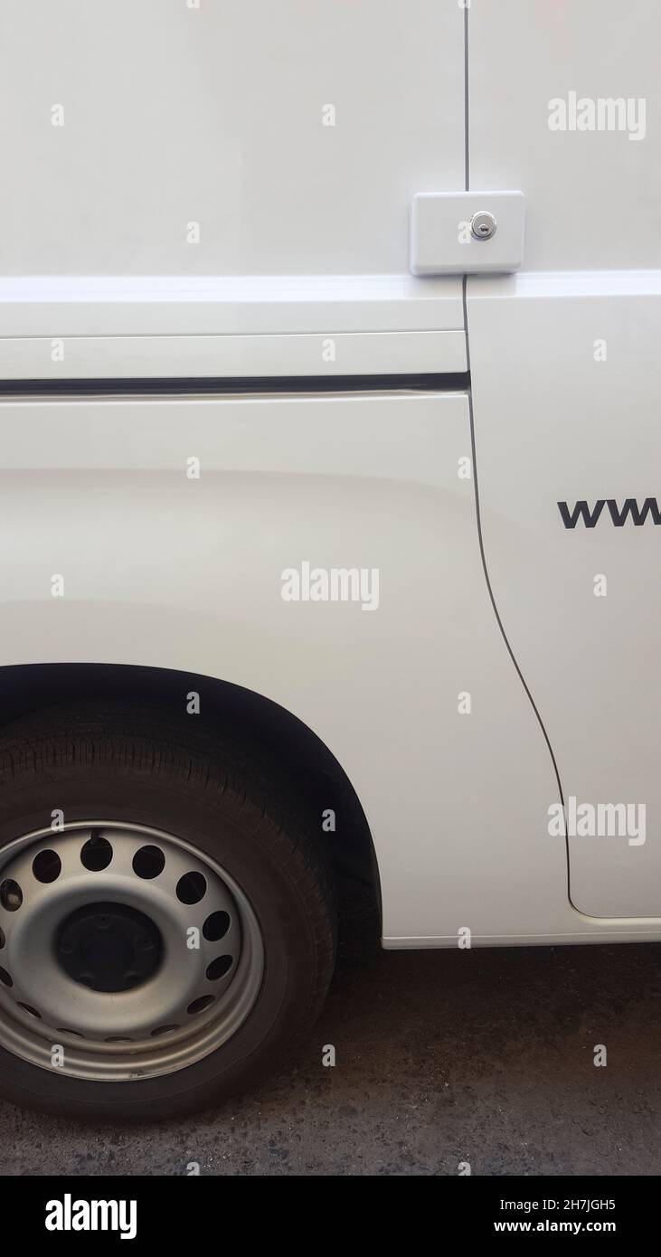 Security system for closed-sheet vans. Sliding side door detail Stock Photo