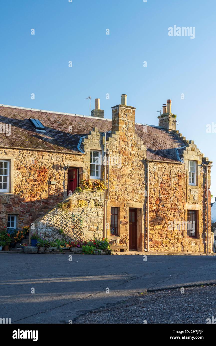 Traditional stone cottages in autumnal sunshine at Crail, East Nuke coast, Scotland Stock Photo