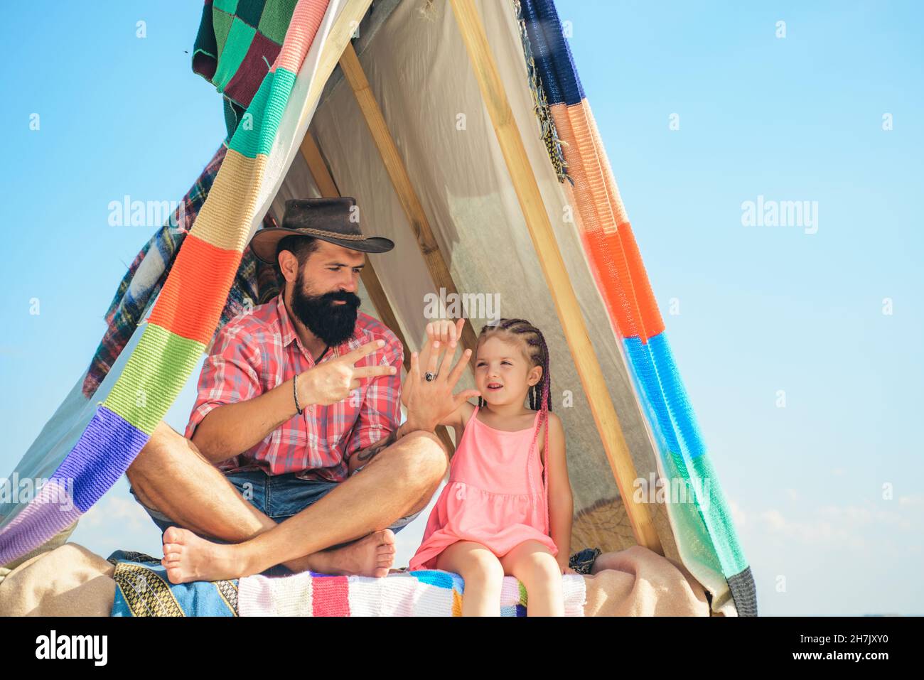 Camping vacation. Father and daughter. Fatherhood and parenting. Family