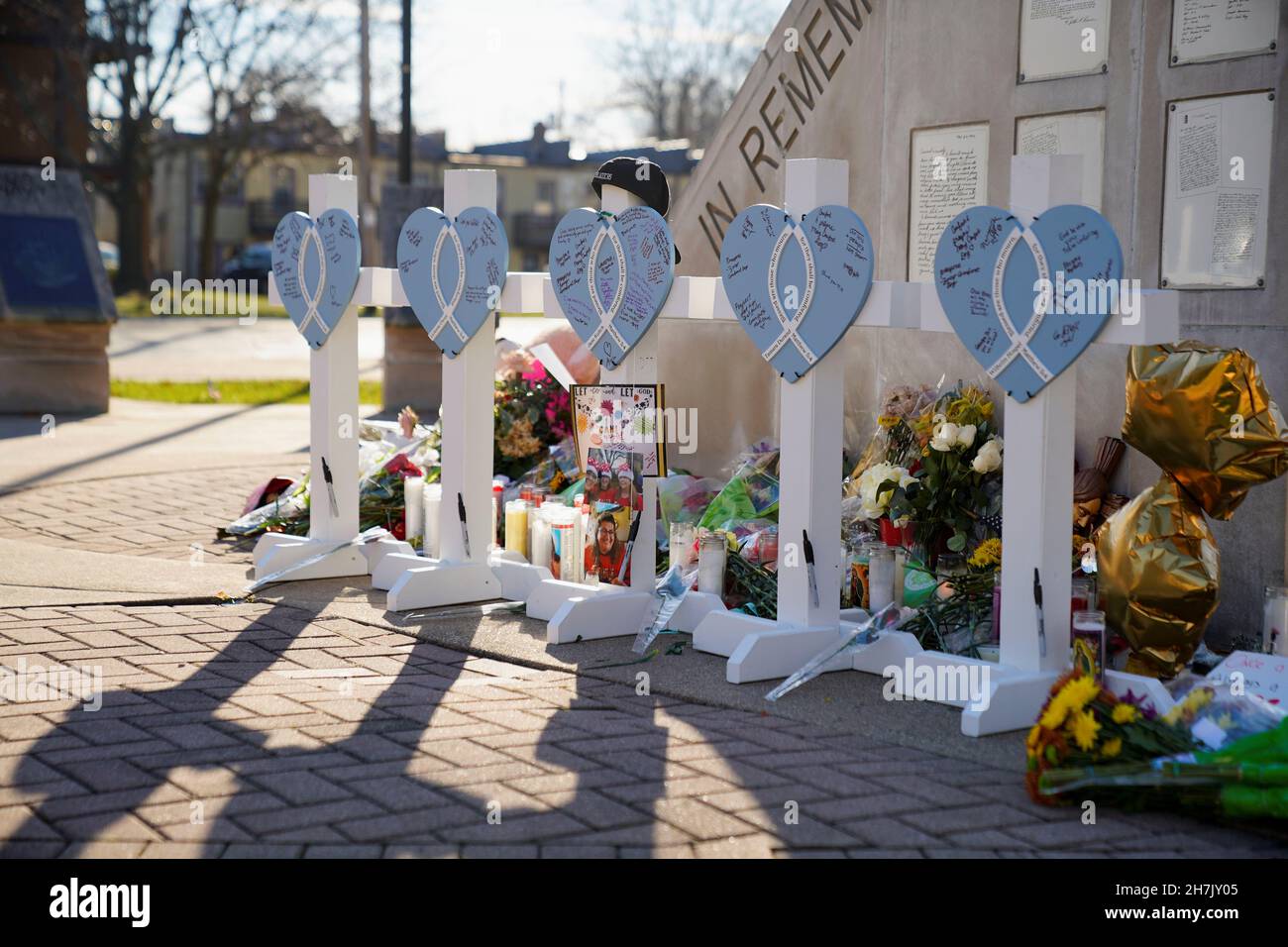 Messages to victims are seen written on crosses after a car plowed through a holiday parade in Waukesha, Wisconsin, U.S., November 23, 2021. REUTERS/Cheney Orr Stock Photo