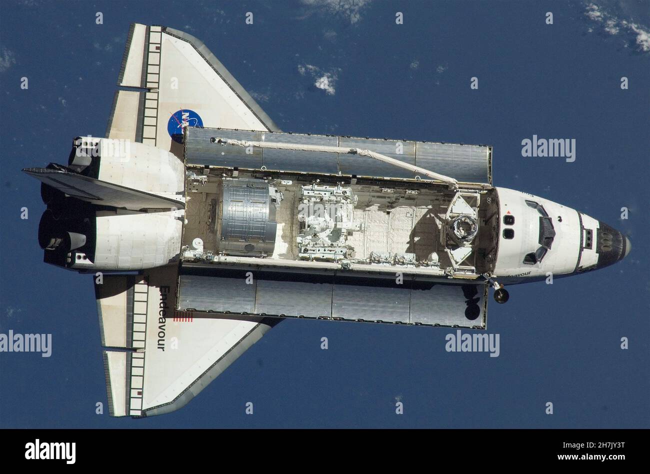 SPACE SHUTTLE ENDEAVOUR in orbit in 2008. Shown here with the load bay open during STS-123 Endeavour flew 25 missions. Photo: NASA Stock Photo
