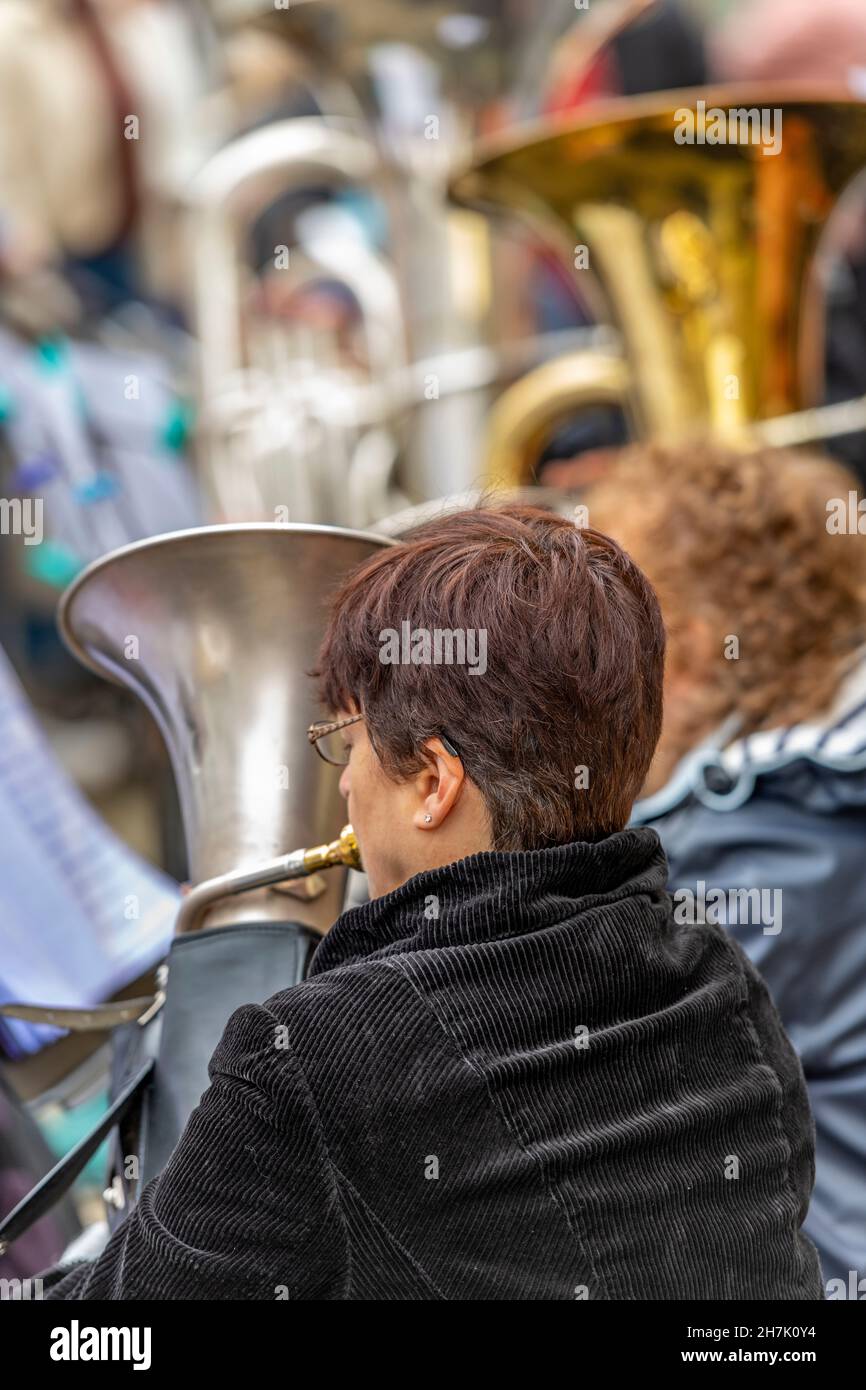 female brass players in a brass band, women playing euphoniums and