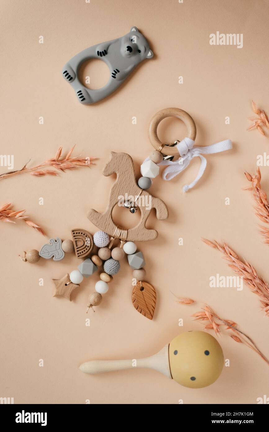 Children's wooden toys, rattles and teethers. Copy space Stock Photo Alamy