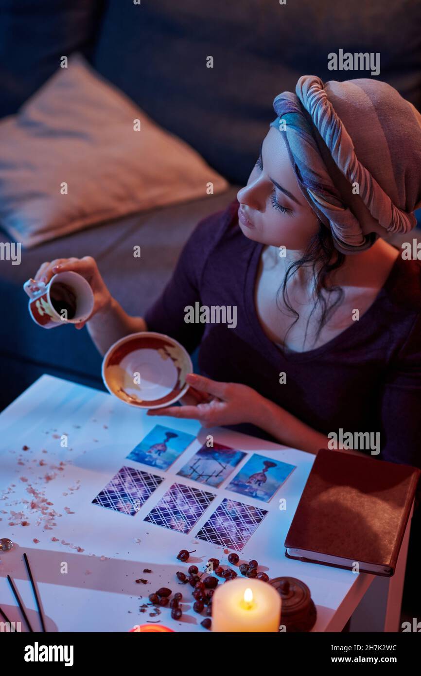 Focused starting the coffee reading procedure Stock