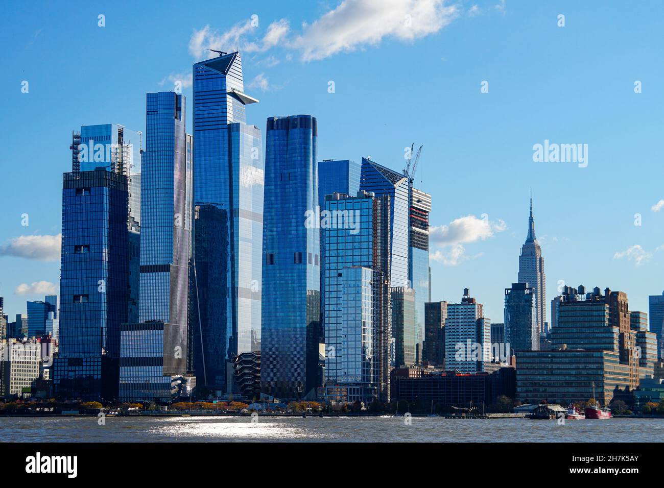 Skyscrapers soar above the modern shoreline in New York City Stock Photo