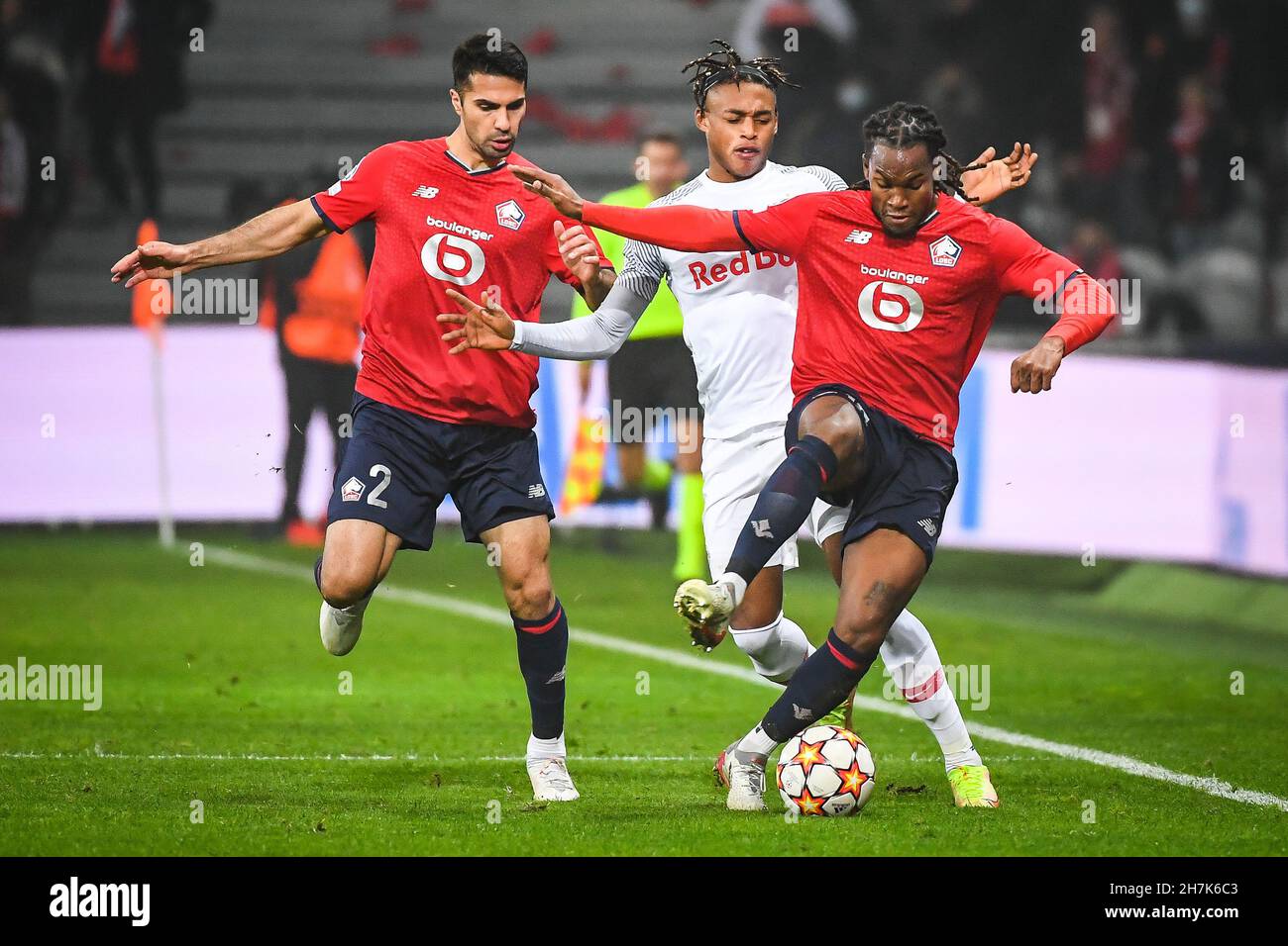 Lille, France, November 23, 2021, Zeki CELIK of Lille, Junior ADAMU of RB  Salzbourg and Renato SANCHES of Lille during the UEFA Champions League,  Group G football match between Lille LOSC and
