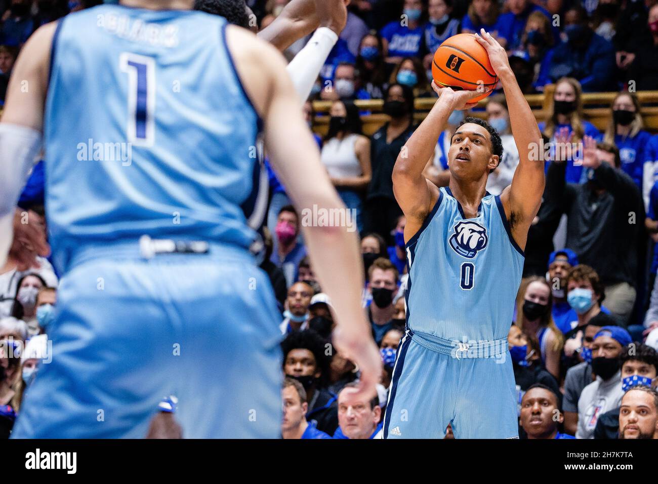 Durham, NC, USA. 22nd Nov, 2021. Citadel Bulldogs forward Jackson Price (0) shoots a three pointer against the Duke Blue Devils during the first half of the NCAA basketball matchup at Cameron Indoor in Durham, NC. (Scott Kinser/Cal Sport Media). Credit: csm/Alamy Live News Stock Photo