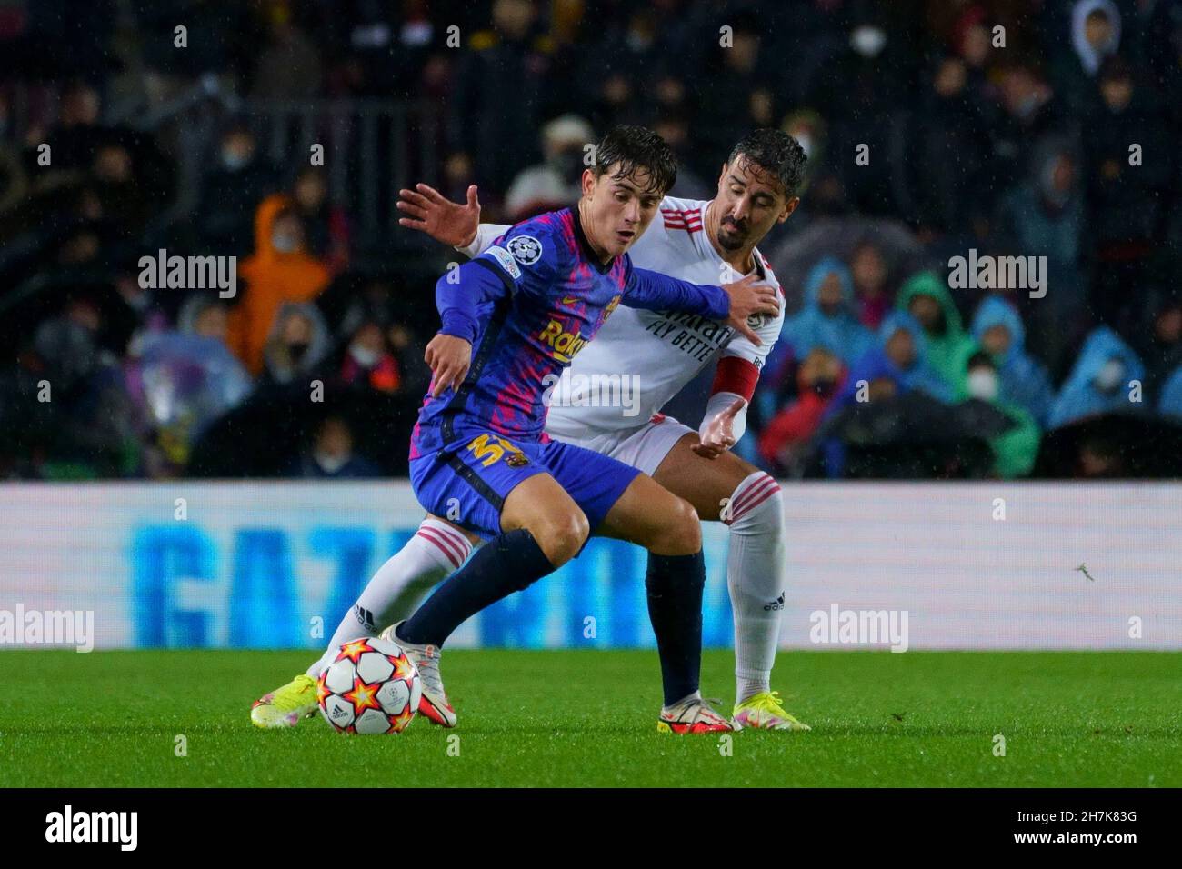 Barcelona, Spain. 23rd November 2021; Nou Camp, Barcelona, Spain: Champions League football, FC Barcelona versus Benfica: Gavi of Barcelona moves the ball away from Andre Almeida Credit: Action Plus Sports Images/Alamy Live News Stock Photo