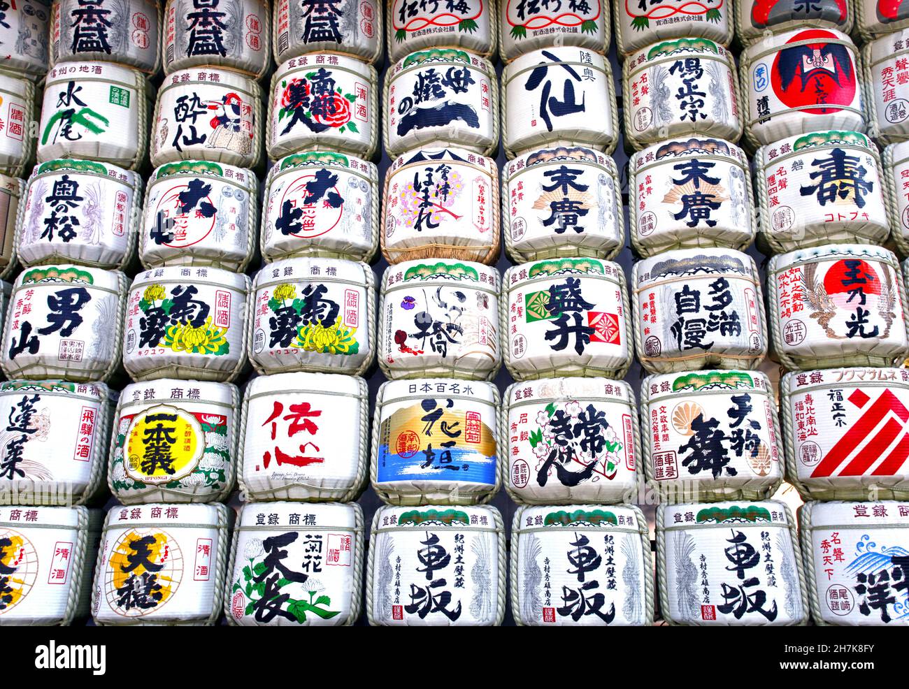 The Meiji Jingu Shrine Sake Barrels can be found along the road to the shrine and are a decorative display giving honor to the gods. Stock Photo