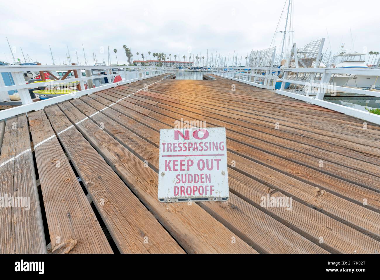 No tresspassing sign on a wooden dock at Oceanside, California. Signage ...