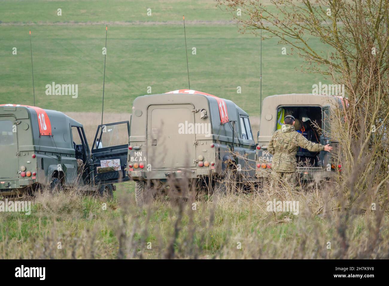 british army land rover defender wolf in action on a military exercise, Wiltshire UK Stock Photo