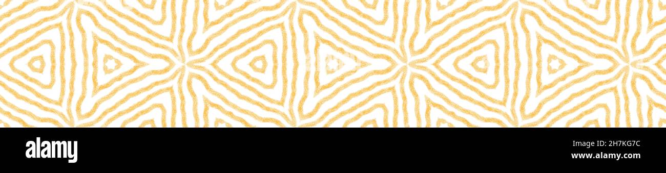 Ikat repeating seamless border. Yellow symmetrical kaleidoscope background. magnetic decorative design element for background. Summer ikat sweamwear p Stock Photo