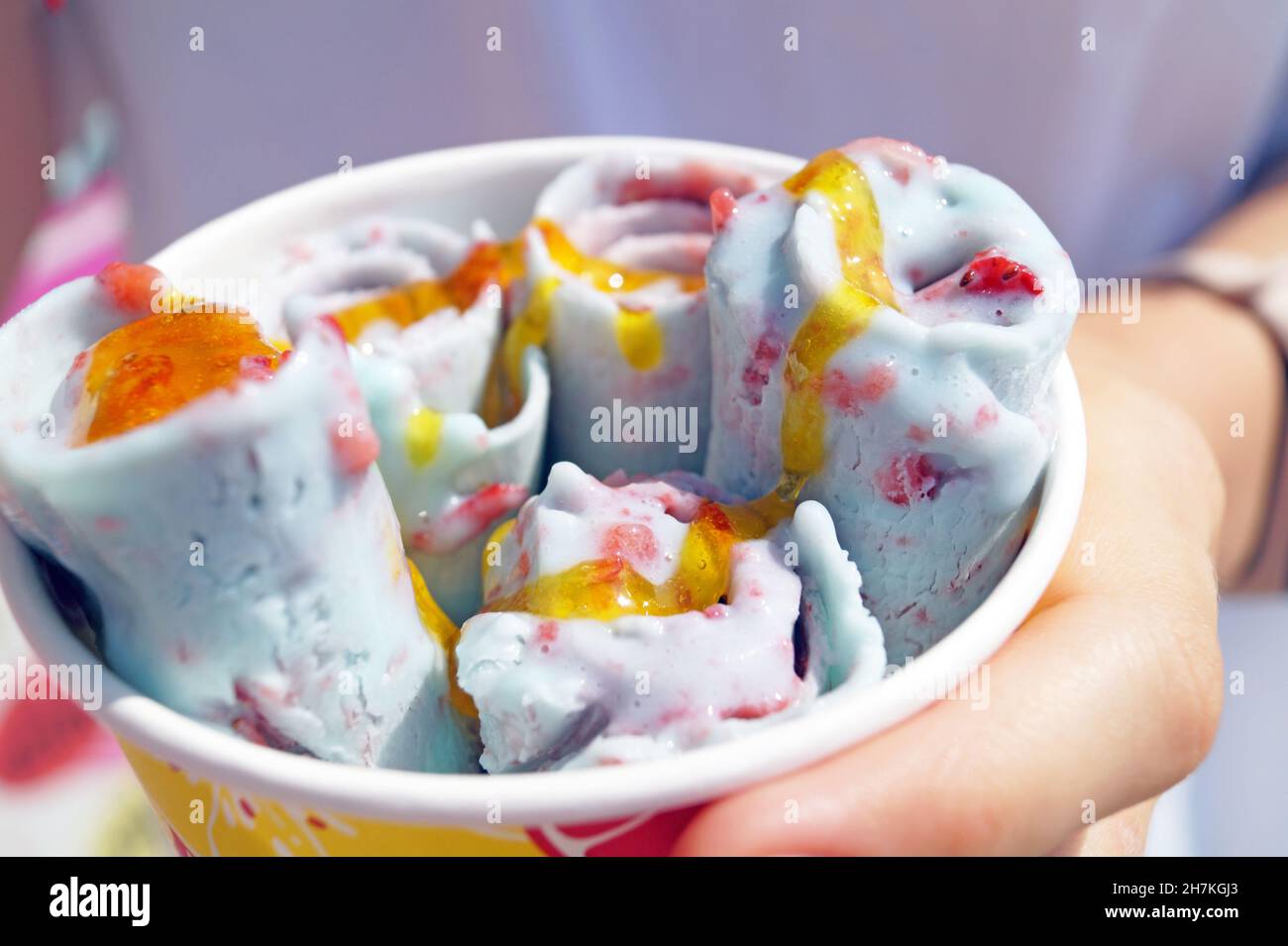 Fried ice cream rolls in a paper cup Stock Photo - Alamy