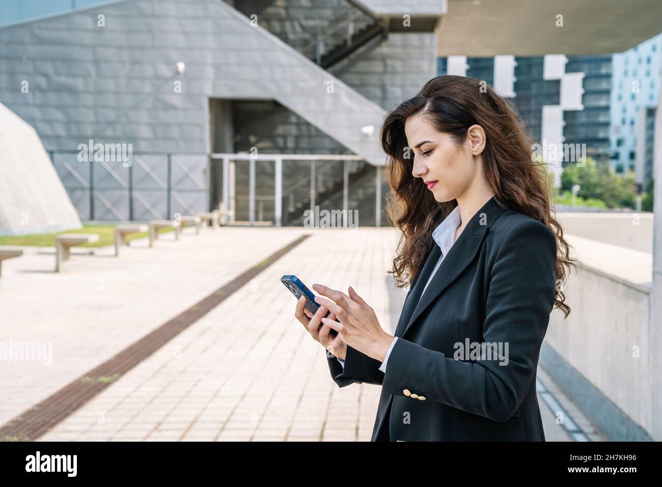 Serious female in elegant suit hi-res stock photography and images - Alamy
