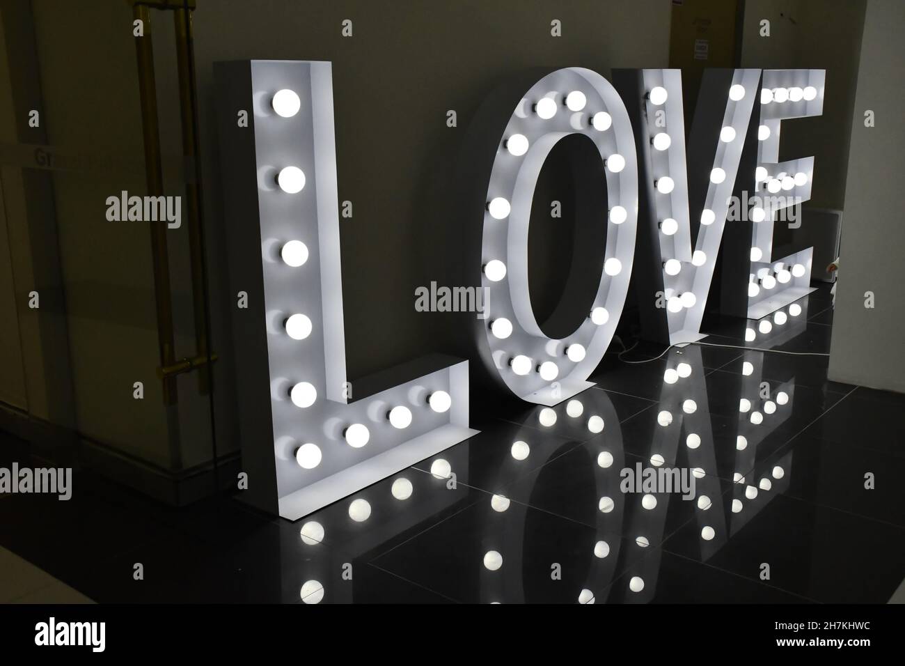 Closeup of a lit-up sign that spells out love Stock Photo