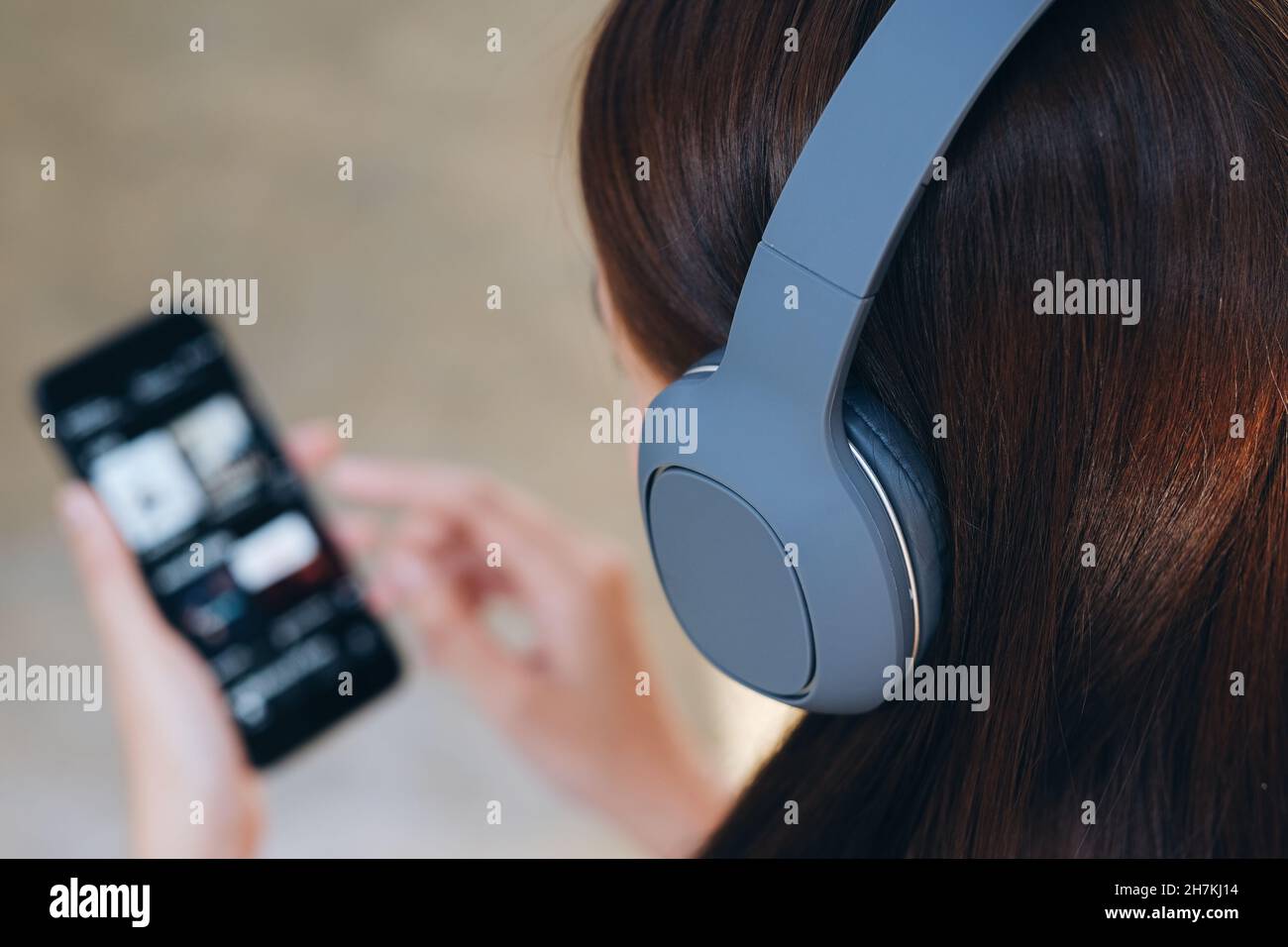 Young woman using smart phone. Stock Photo