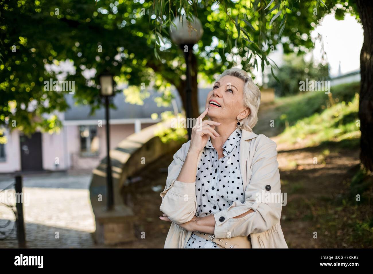 Thoughtful senior woman hand hi-res stock photography and images - Alamy