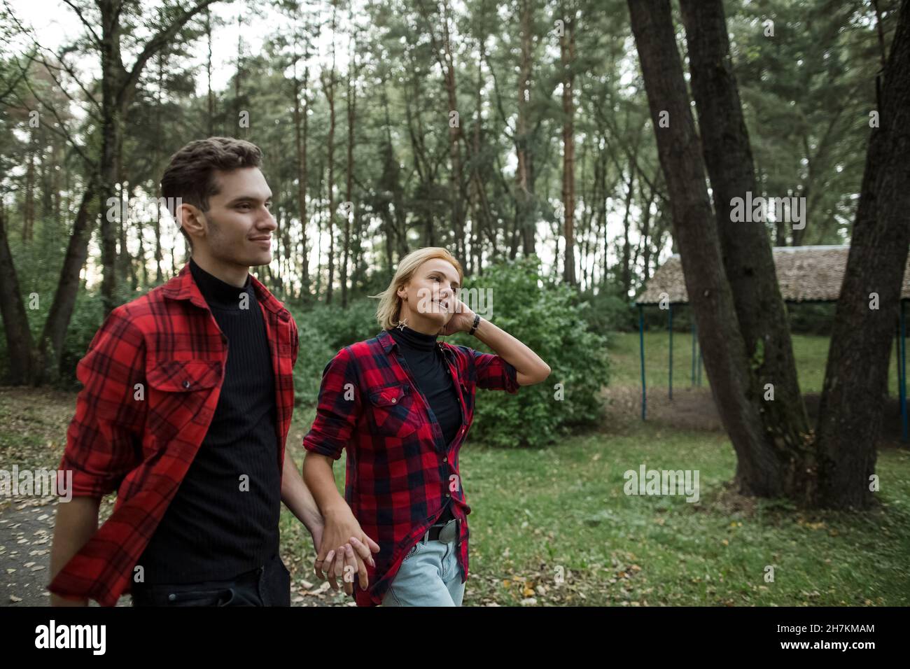Couple walking holding hands hi-res stock photography and images - Alamy