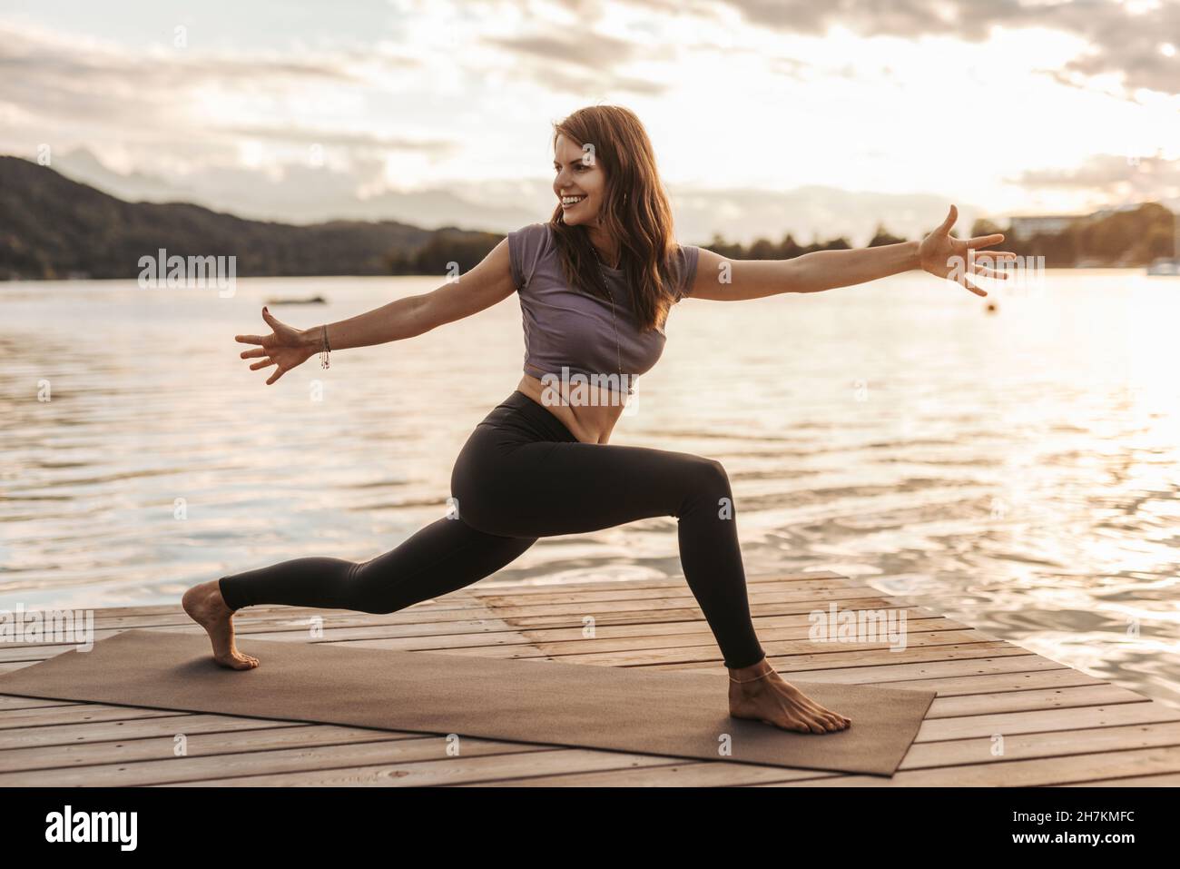 Woman outstretched arms yoga hi-res stock photography and images - Alamy