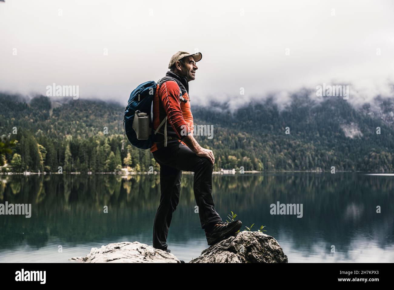 Hiker standing on a rock hi-res stock photography and images - Alamy