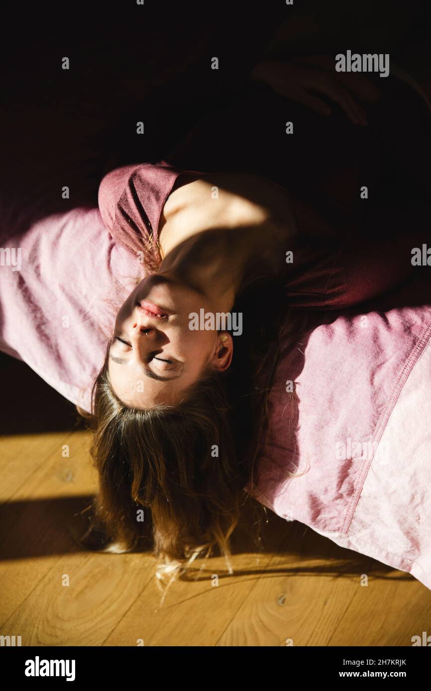 Lonely young female on dark hi-res stock photography and images - Alamy